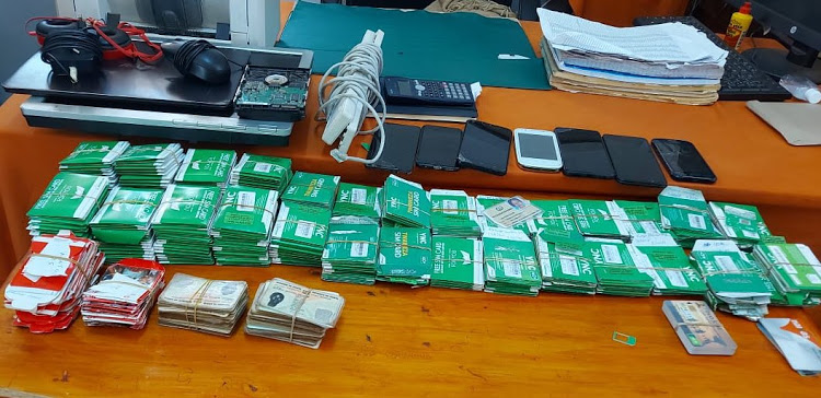 Two M-Pesa fraudsters arrested in Machakos, over 600 sim cards recovered